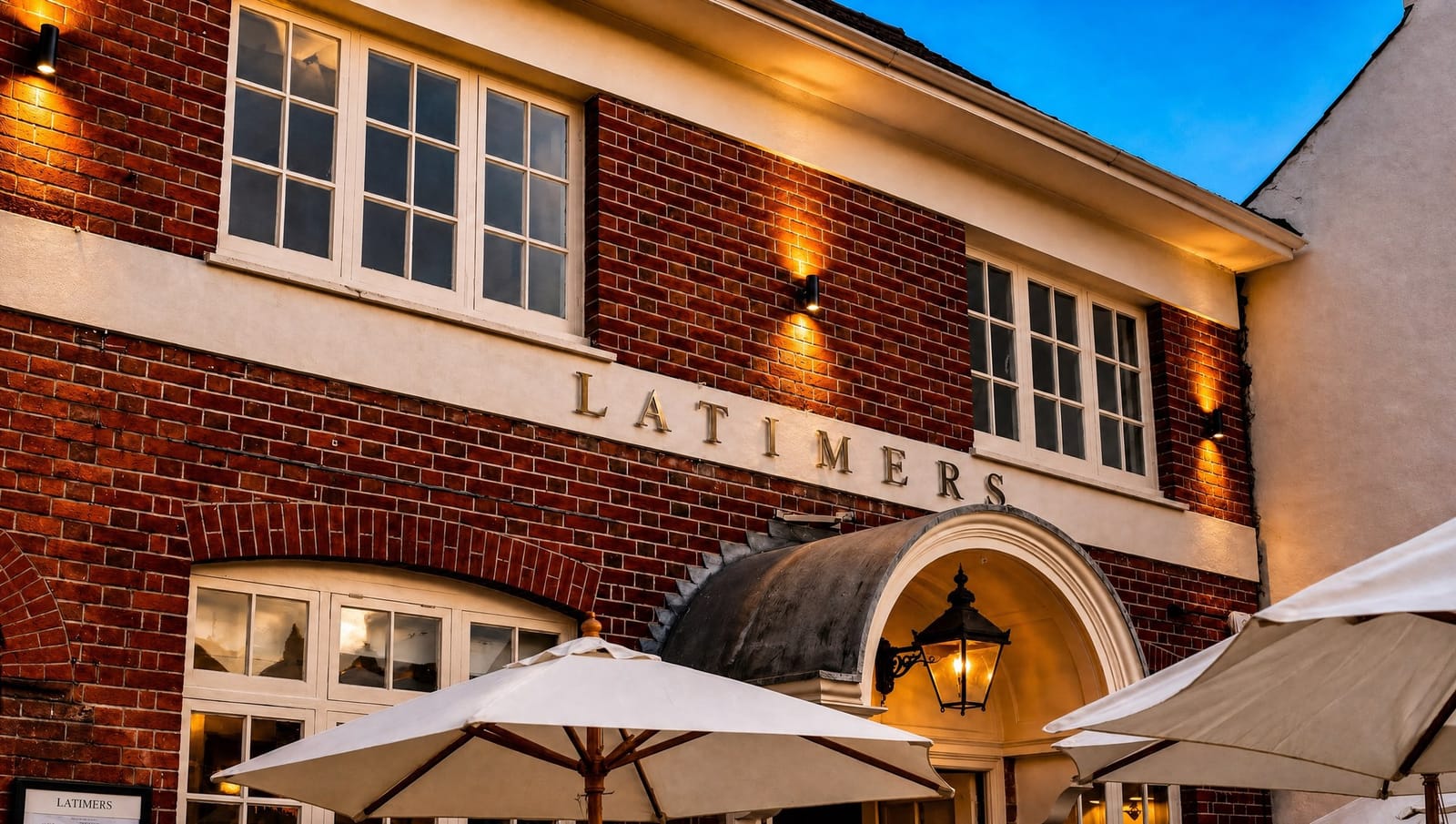 Latimers restaurant on Latimer Street, Romsey, lit at dusk